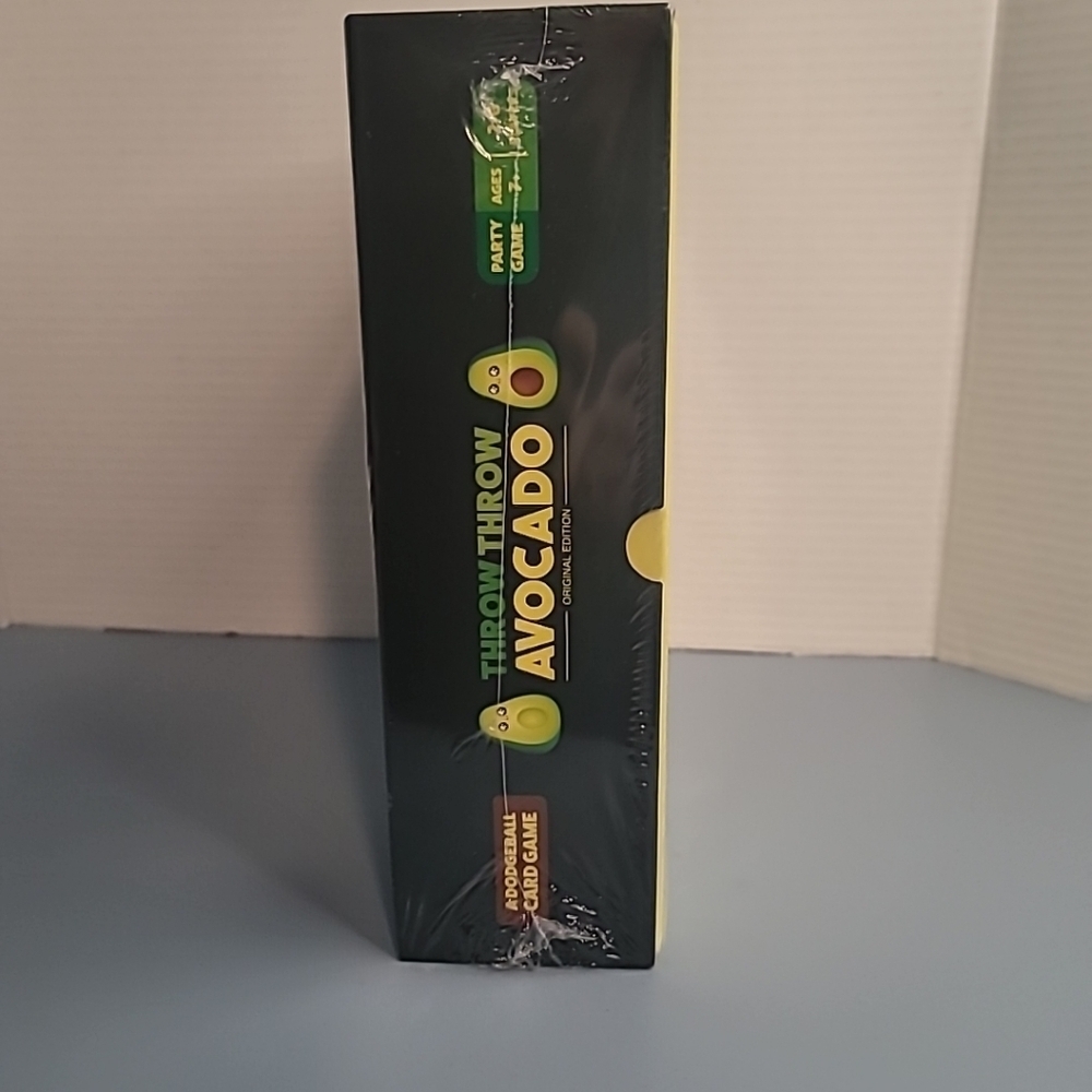 NIB Exploding Kittens Throw Throw Avocado Card Game With Flight Suit Ages 7 - Picture 2 of 4
